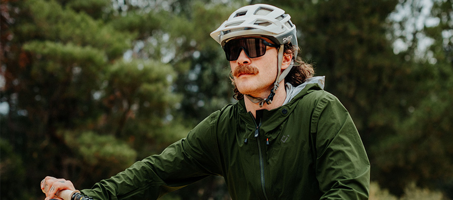 Mountain biker wearing Smith helmet and sunglasses