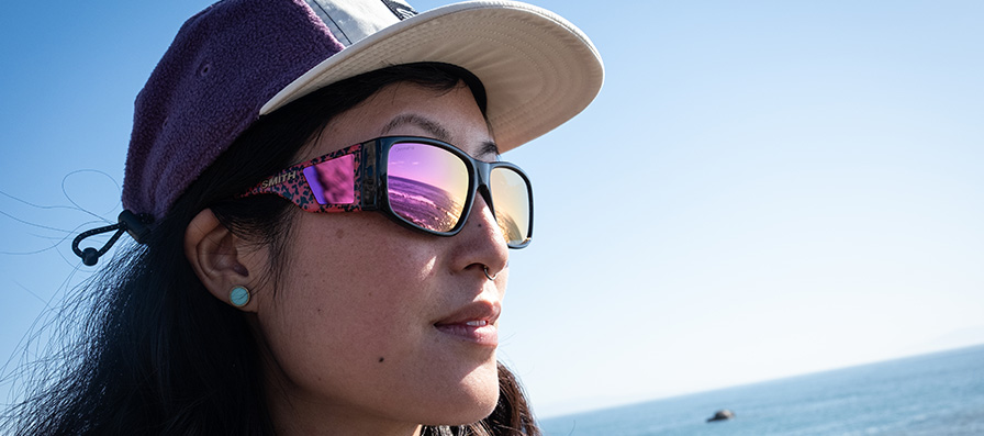 Person wearing Monroe Peak sunglasses in wild child print