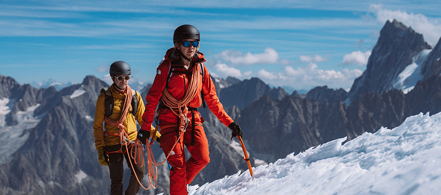 Mountaineers wearing Smith backcountry helmets and touring sunglasses