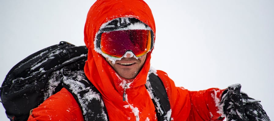 Skier wearing Smith 4D MAG goggles