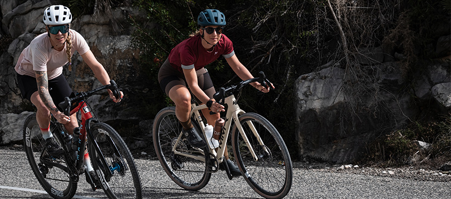 road cyclists wearing Smith helmets and sunglasses