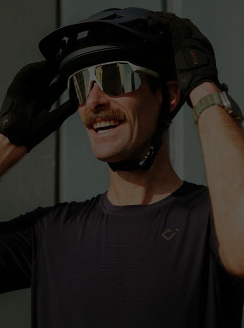 Man wearing Smith Motive Sunglasses and Payroll Helmet