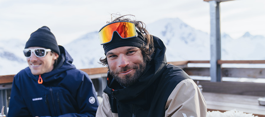 Skiers wearing Smith Pursuit and Embark sunglasses