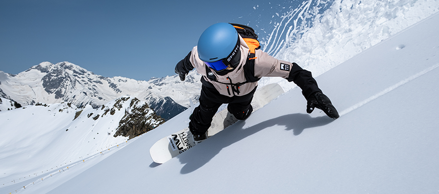 Snowboarder wearing Smith Method Pro helmet