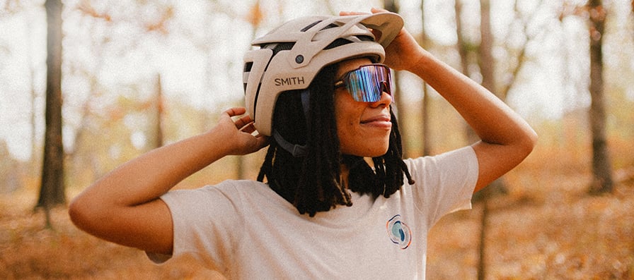 Brooklyn Bell adjusting the visor on the Forefront 3 helmet