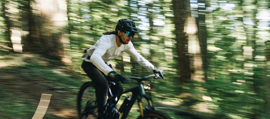 Mountain biker wearing Smith Forefront 2 MTB Helmet and Wildcat sunglasses