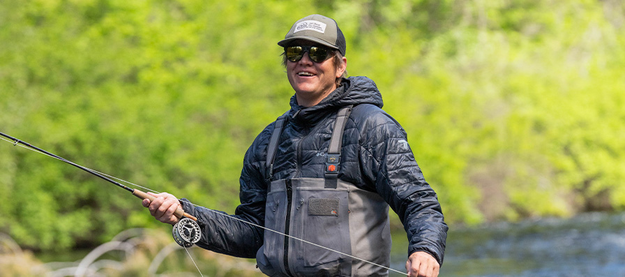 Fly fisher wearing Smith Venture sunglasses