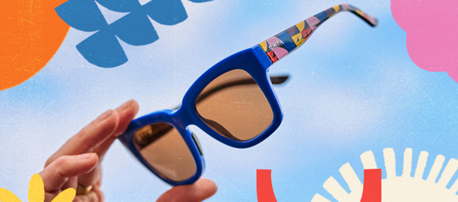 Hand holding the limited-edition Smith x Lisa Congdon Sway sunglasses